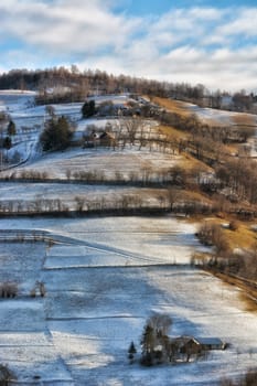 Frozen sunny day of a winter, on wild transylvania hills. Holbav. Romania. Low key, dark background, spot lighting, and rich Old Masters