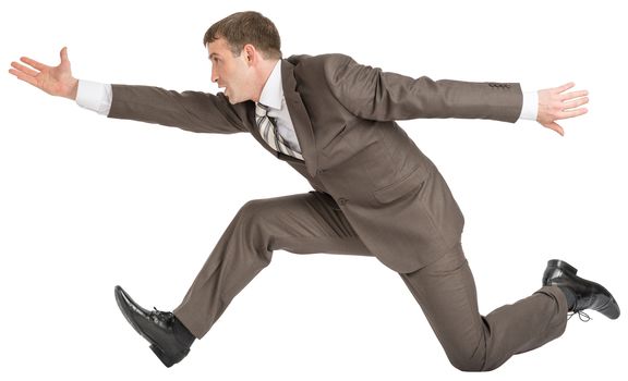 Businessman running fast on isolated white background