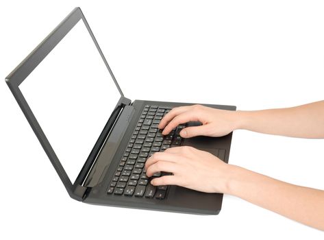 Female hands using laptop on isolated white background, closeup