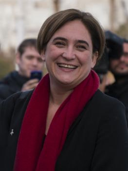 SPAIN, Barcelona: Barcelona Mayor Ada Colau smiles after arriving for the Three Kings Day procession in Barcelona, Spain on January 5, 2016. The annual procession, including men dressed as the historic figures, celebrates the arrival of the Three Wise Men to Bethlehem, and marks the end of the Christian holiday season.