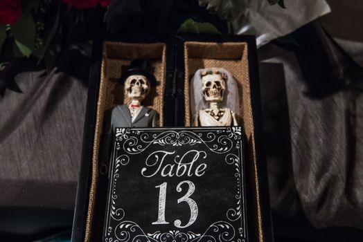 Image of table number 13 featuring day of the dead figures