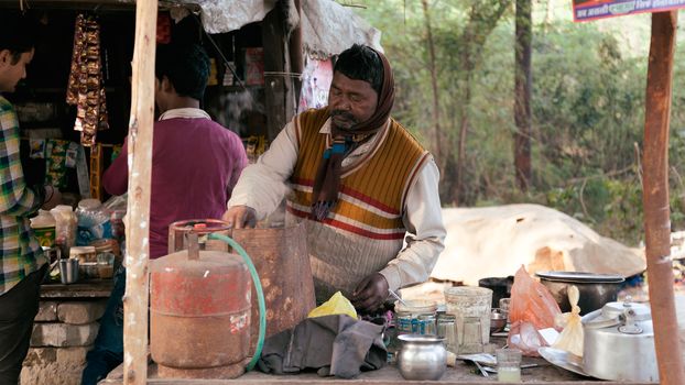 A Local street tea vendor preparing tea. Dec 13, 2015, Kanpur, India.