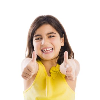 Studio portrait of a beautiful girl with thumbs up, isolated over white background