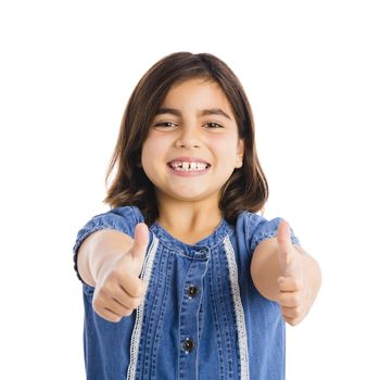 Studio portrait of a beautiful girl with thumbs up, isolated over white background