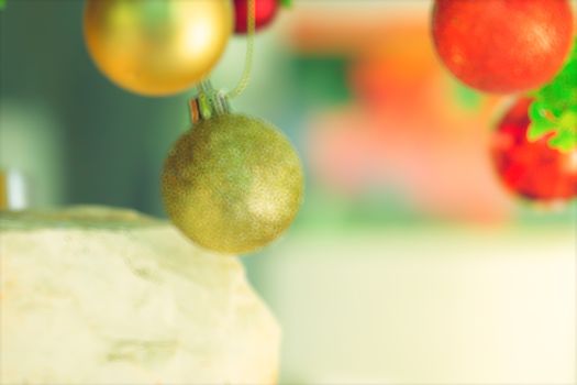 bokeh Christmas balls and Christmas tree with light background