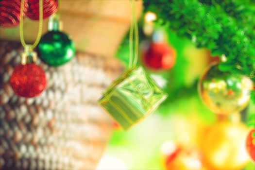 bokeh Christmas balls and Christmas tree with light background