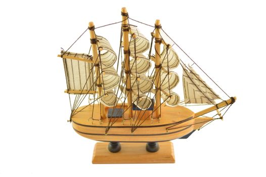 Closeup of a model ship isolated on white background