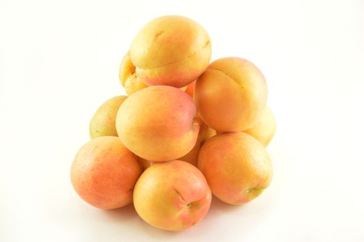 Group of apricots on white background