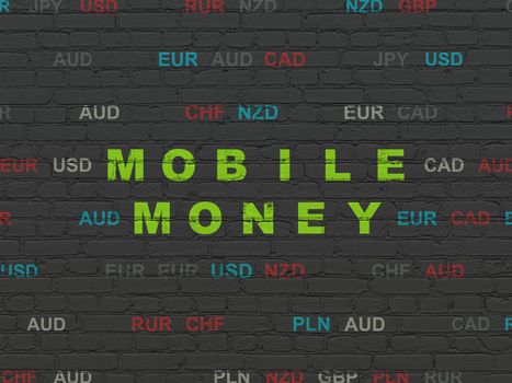 Currency concept: Painted green text Mobile Money on Black Brick wall background with Currency