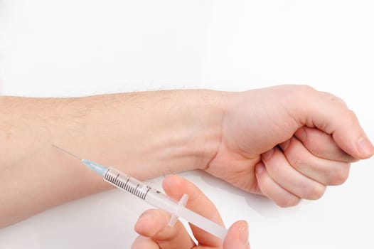 flu Injection on hand on white background