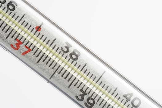 macro of thermometer on white with 36 and 6