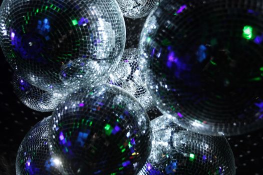 Shiny disco balls on a dark background