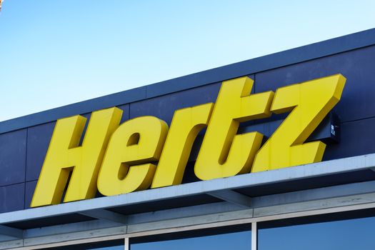 PASADENA, CA/USA - JANUARY 2, 2016: Hertz  sign and logo. The Hertz Corporation is an American car rental company.