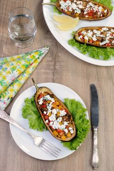 Stuffed eggplant with ricotta and vegetables in lettuce 