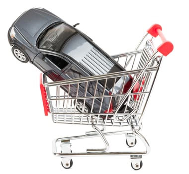 Car in shopping cart isolated on white background, side view