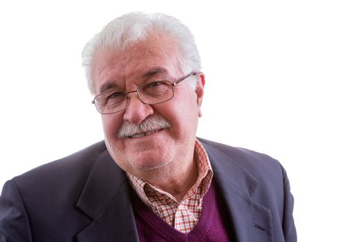 White-haired retired elderly gentleman looking at the camera with a genuine quiet smile, head and shoulders isolated on white