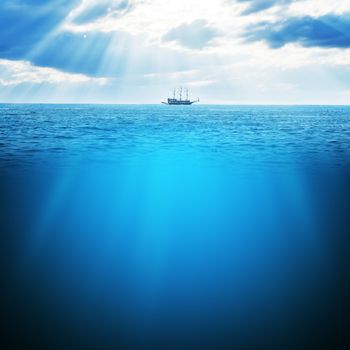 Blue ocean with ship and sunrise, nature concept