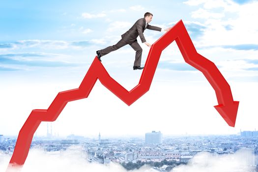 Businessman climbing up falling red arrow from above city