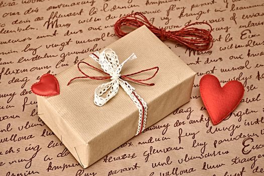 Love hearts, Valentines Day. Handcraft gift box, present. Red felt hearts. Retro romantic styled. Vintage retro concept, unusual greeting card. Copyspase
