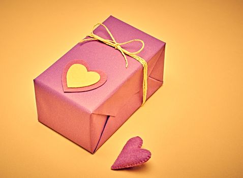 Love hearts, Valentines Day. Handcraft gift box, presents. Retro romantic styled. Vintage retro concept, unusual greeting card. Kraft paper, multicolored felt, copyspase