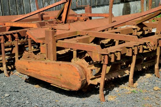 Old and rusty machinery.
Old agricultural machinery long past it's working life.