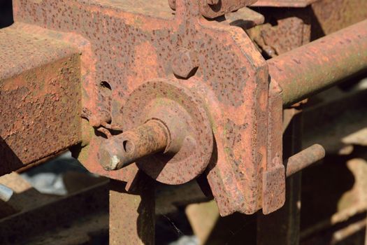 Old and rusty machinery.
Old agricultural machinery long past it's working life.