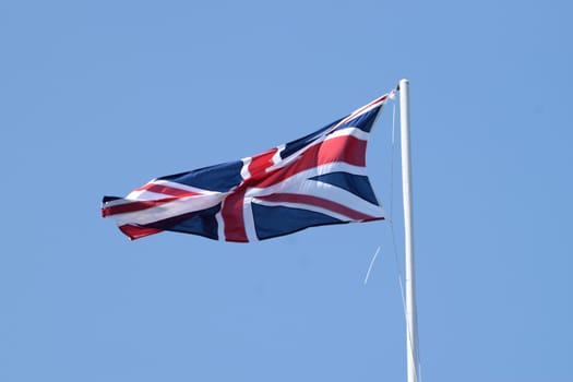 Union Jack, the national flag of the United Kingdom which comprises, England,Scotland,Wales and Northern Ireland.