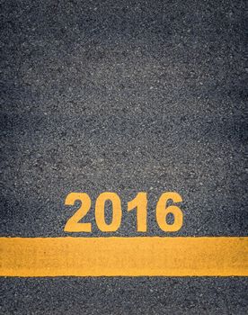 Conceptual Image Of Year 2016 As Yellow Asphalt Road Markings With Single Line And Copy Space