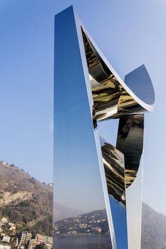 Como, Italy, january 1st 2016: Life Electric (also known as The Life Electric) is a contemporary sculpture, dedicated to the physicist Alessandro Volta (1745-1827). Completed in 2015 it is located in Como, Italy. Life Electric was designed by Daniel Libeskind, and was a gift to Como, the city where the architect located his “Summer Session” school of architecture, in 1988. The sculpture was commissioned by the non profit association “Gli amici di Como”. The design of the fountain illustrates the evolution of modern architecture that took place over the period from 1920s to modern days, with the emergence of Rationalism. Libeskind’s creation has carried on the tradition of contemporary art in Como, and raised it's profile.