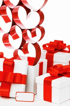 Gifts in white boxes with red ribbons and hearts isolated on white background