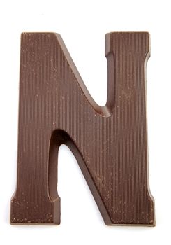 Chocolate letter N for Sinterklaas, event in the Dutch in december over white background