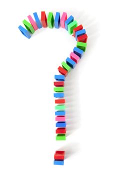 colorful domino bricks in shape of question mark isolated on white background