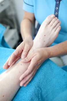 Massage of feet by pedicure