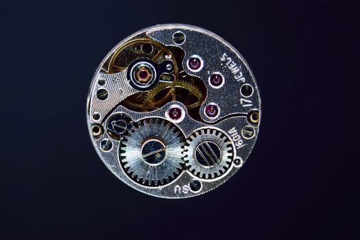 Watch Parts dismantled.
Macro study of  precisely engineered watch parts.
