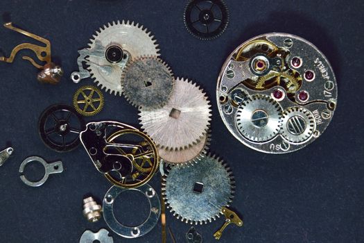 Watch Parts dismantled.
Macro study of  precisely engineered watch parts.
