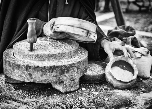 Ancient millstone that was turned by hand to produce flour and homemade bread.