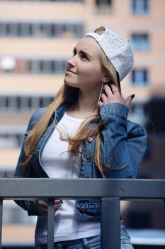 Beautiful modern girl outdoors, urban fashion youth style