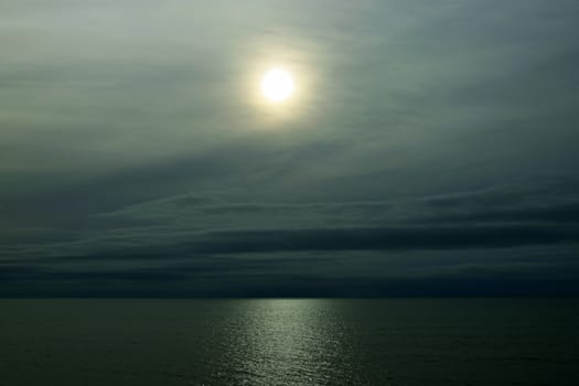 Moon over the Ocean, a calm sea and romance in the air.