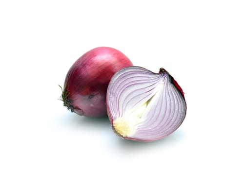 Raw red fresh cut onion over white