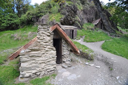 Arrowtown, near Queenstown, Otago, New Zealand, is the best example of a goldrush era miners settlement, These Chinese gold diggers arrived during the 1860's gold rush. They made and lived in these primitive huts.