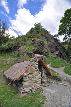 Arrowtown, near Queenstown, Otago, New Zealand, is the best example of a goldrush era miners settlement, These Chinese gold diggers arrived during the 1860's gold rush. They made and lived in these primitive huts.