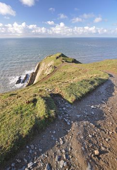 Southwest Coast footpath at Baggy Point headland, Croyde, North Devon, England, a popular walk throughout the year.