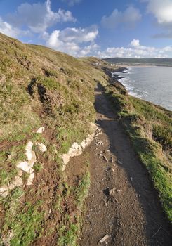 Southwest Coast footpath near Baggy Point headland looking back towards, Croyde, North Devon, England