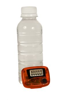 Vertical shot of a red pedometer and water bottle isolated on white background.