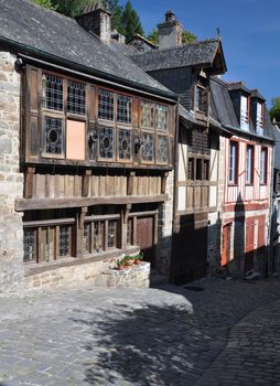 Medieval half-timbered buildings in the ancient french town of Dinan in Brittany. These old houses are in the Rue de Jerzual, which leads into the Rue du Petit Port and then to the River Rance ~ probably the street most visited by tourists