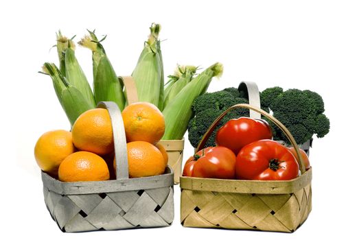 Horizontal shot of varieties of fresh fruits and vegetables.