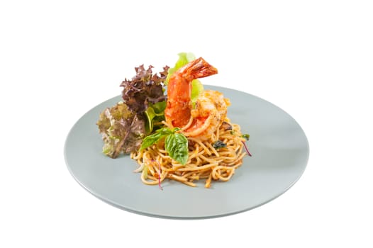 Pasta with Australia tiger prawn in Thai spicy style isolated on white background with clipping path