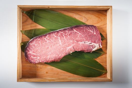 Dry-aged beef in wood tray