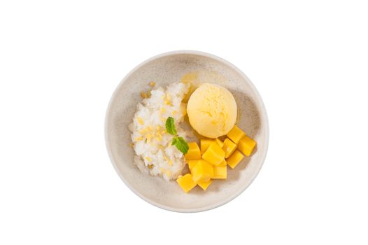 Mango with sticky rice and mango sherbet ice cream in ceramic bowl isolated on white background with clipping path