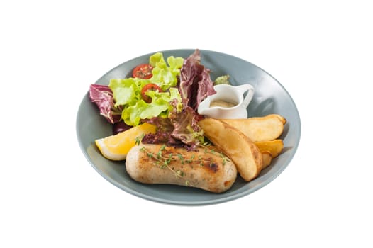 Grilled sausage with fried potatoes and salad isolated on white background with clipping path